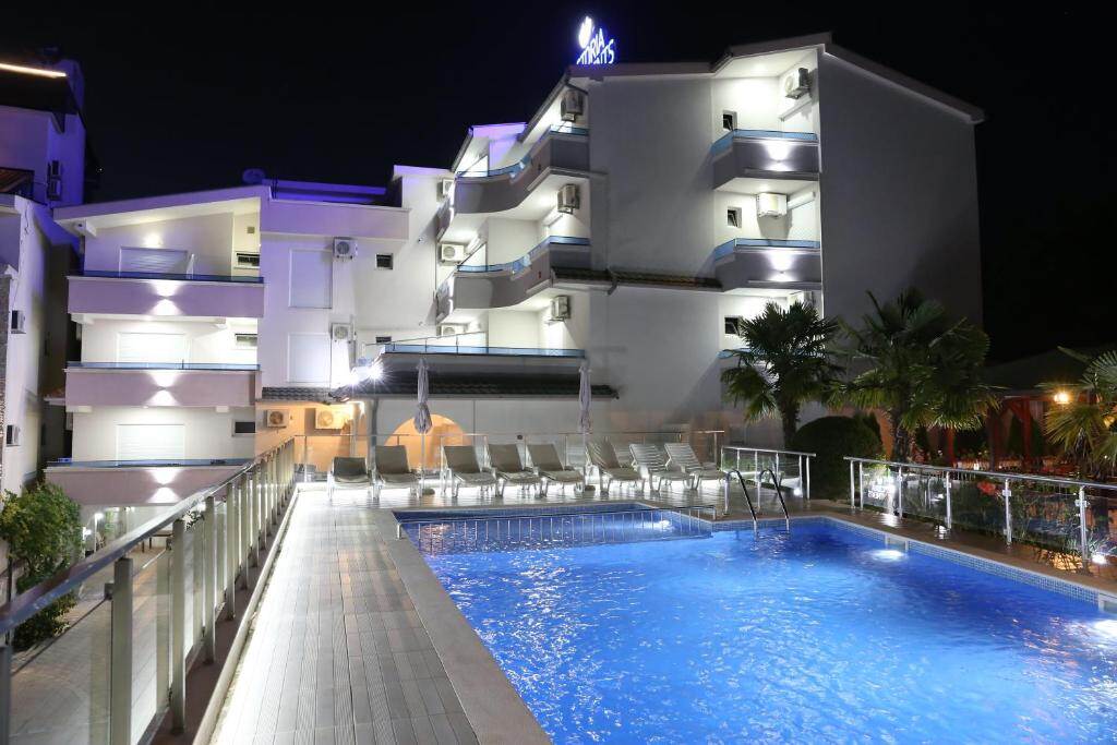 Pool terrace of VICTORIA Apartments in the evening